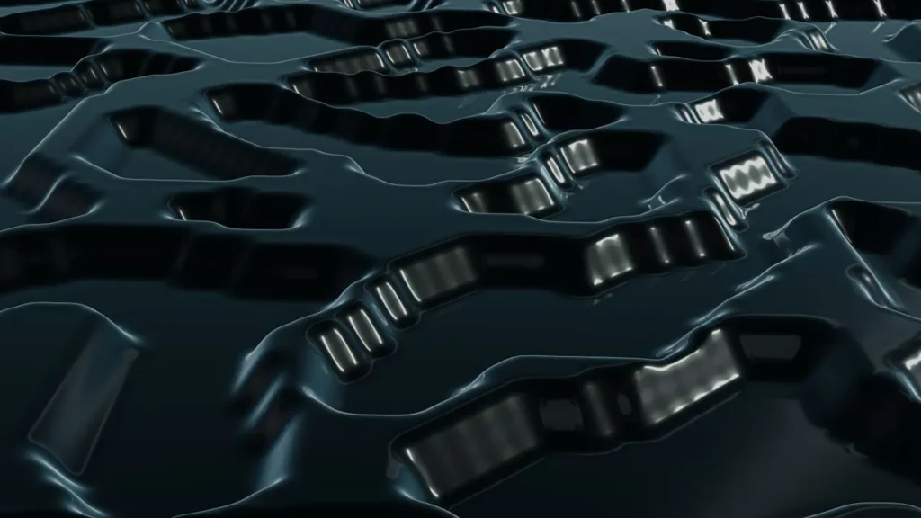 Abstract black metallic surface featuring intricate patterns and textures for creative backgrounds.